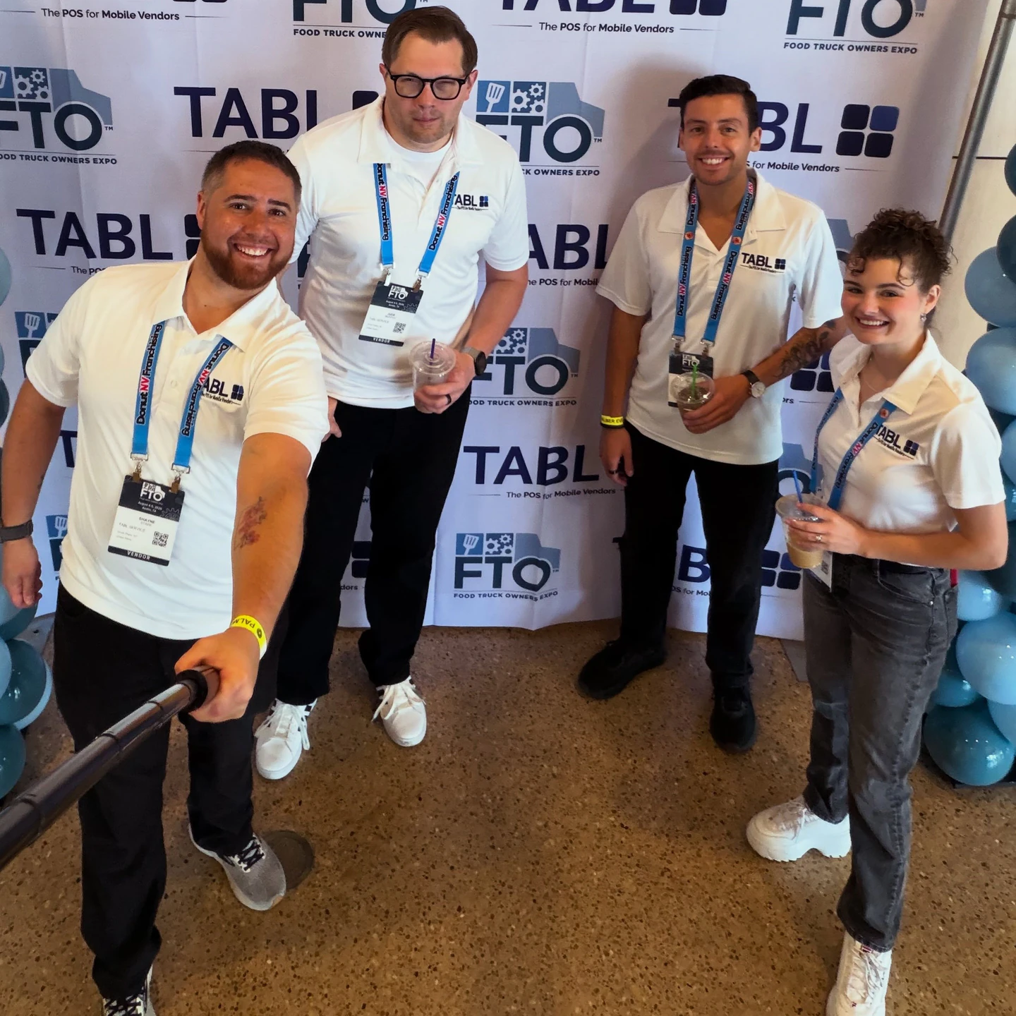 Four members of the TABL team together at the Food Truck Owners Expo.